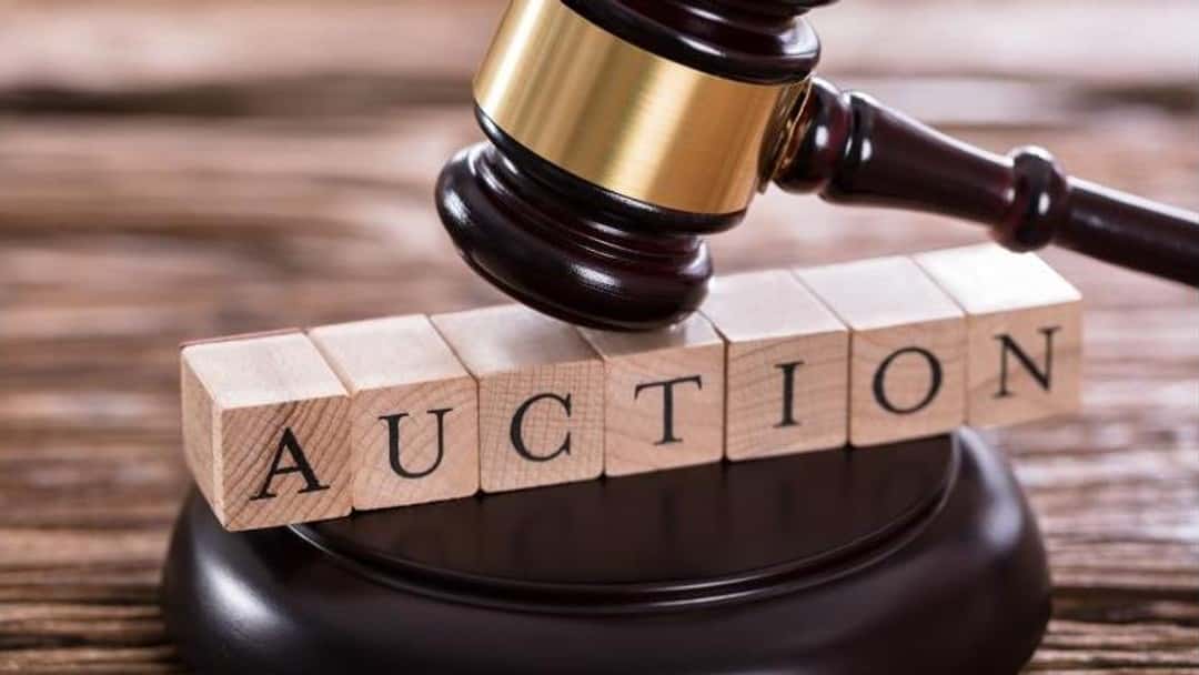 Selling land at auction